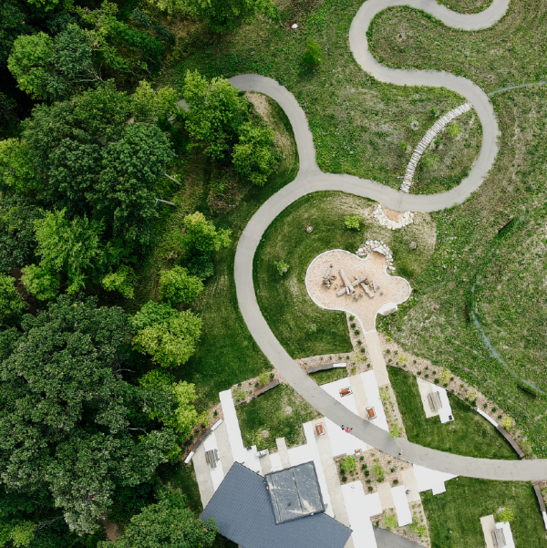 An aerial image of a park with a winding trail.